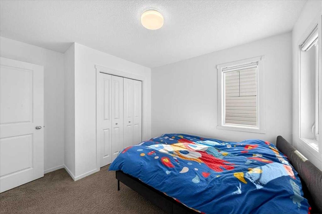 20 Nolancrest Green Nw, Calgary, AB - Indoor Photo Showing Bedroom