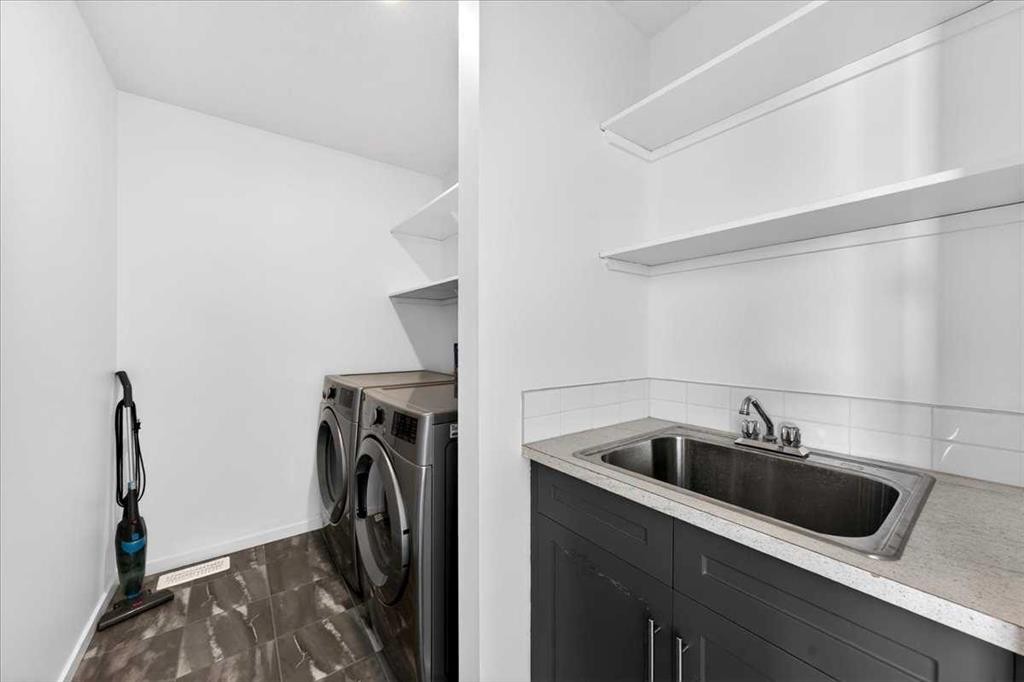 20 Nolancrest Green Nw, Calgary, AB - Indoor Photo Showing Laundry Room