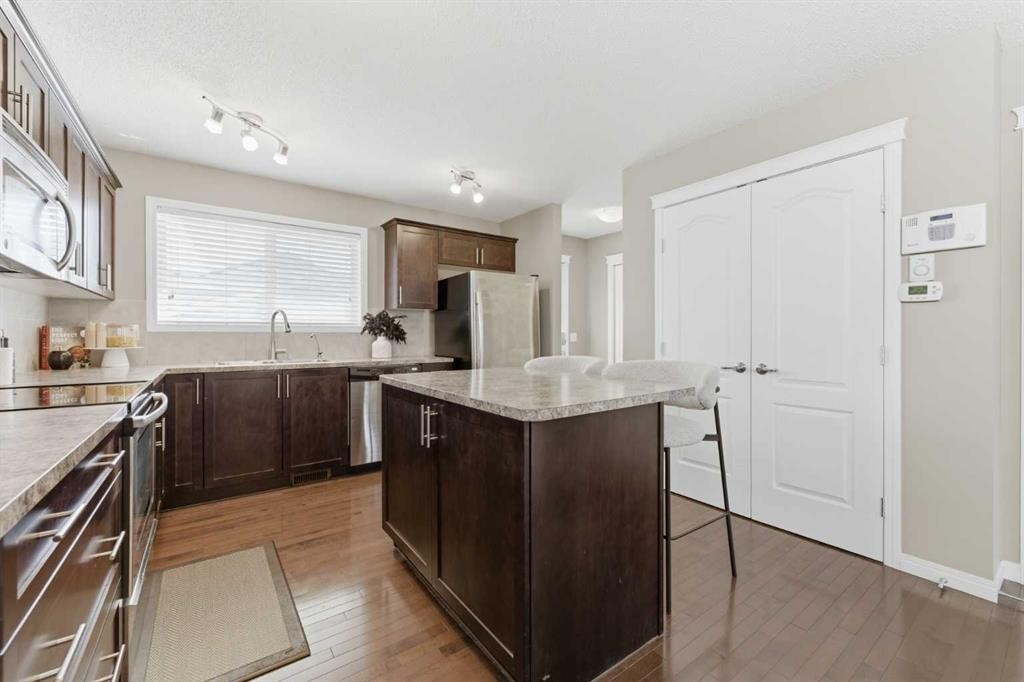 87 Sage Hill Way Nw, Calgary, AB - Indoor Photo Showing Kitchen With Upgraded Kitchen