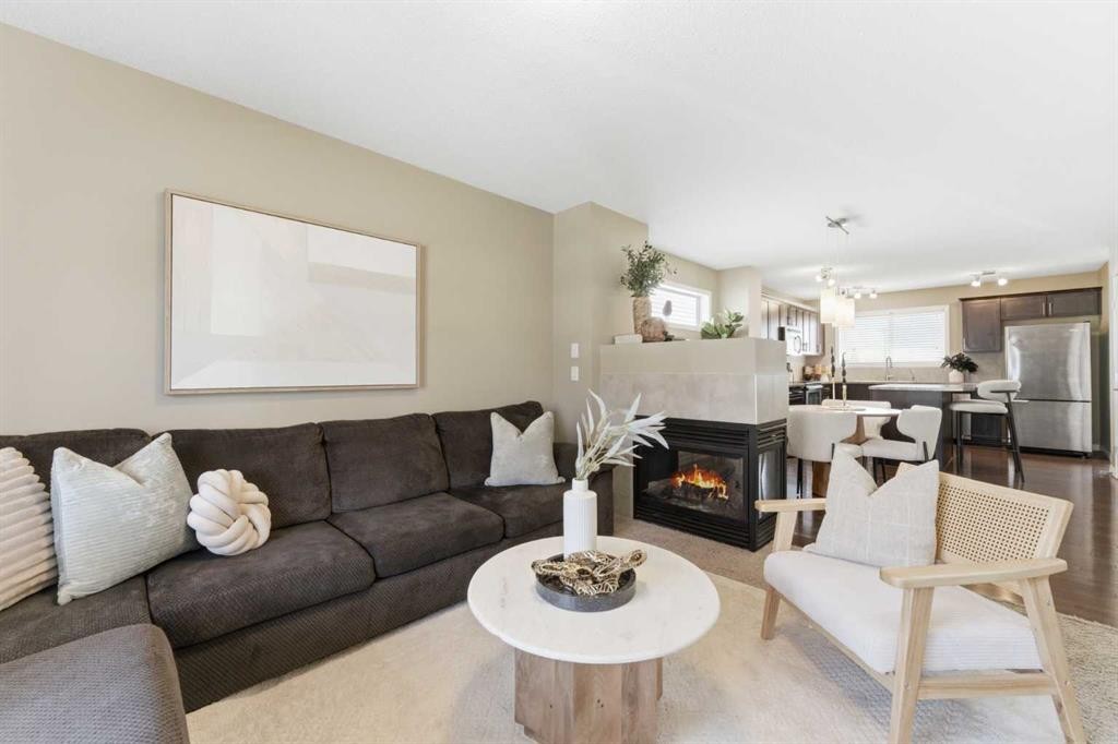 87 Sage Hill Way Nw, Calgary, AB - Indoor Photo Showing Living Room With Fireplace