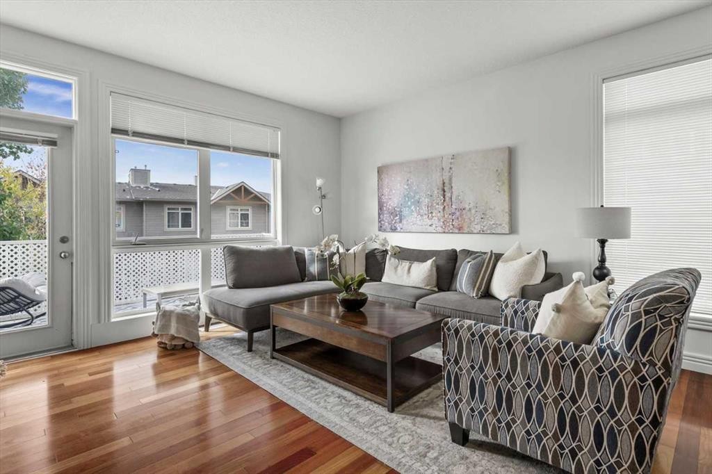 1-164 Rockyledge View Nw, Calgary, AB - Indoor Photo Showing Living Room