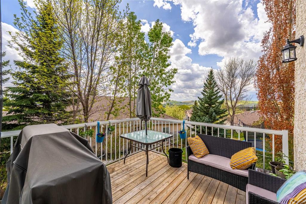 648 Scimitar Bay Nw, Calgary, AB - Outdoor With Deck Patio Veranda