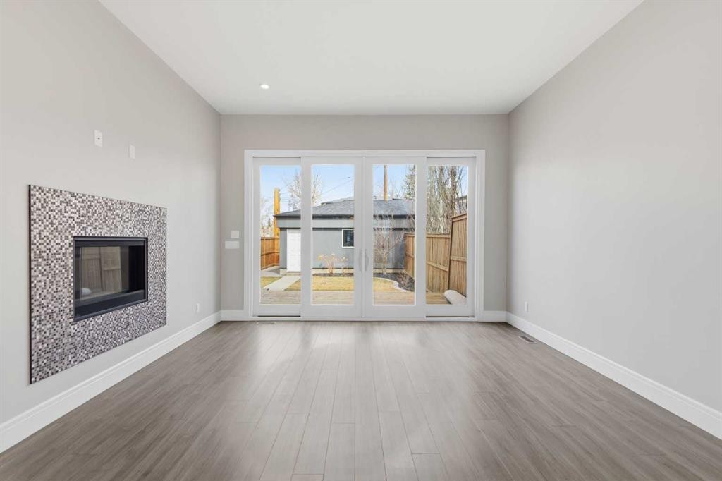 2052 46 Avenue Sw, Calgary, AB - Indoor Photo Showing Living Room With Fireplace