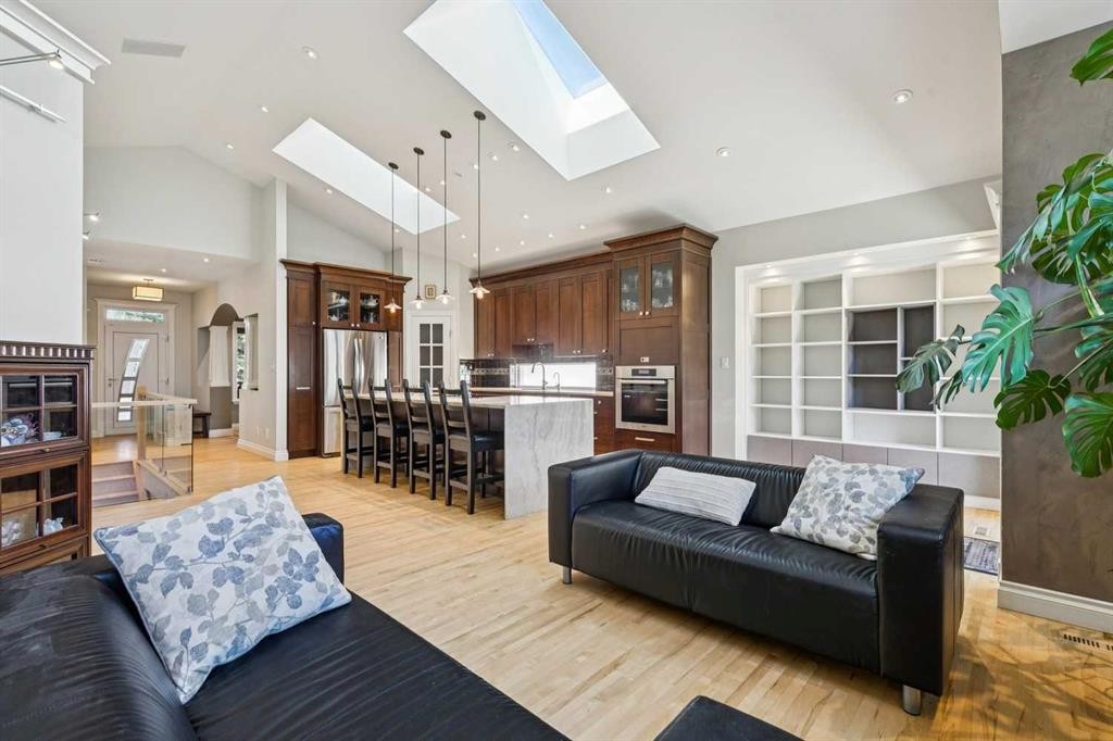 367 Discovery Place Sw, Calgary, AB - Indoor Photo Showing Living Room With Fireplace
