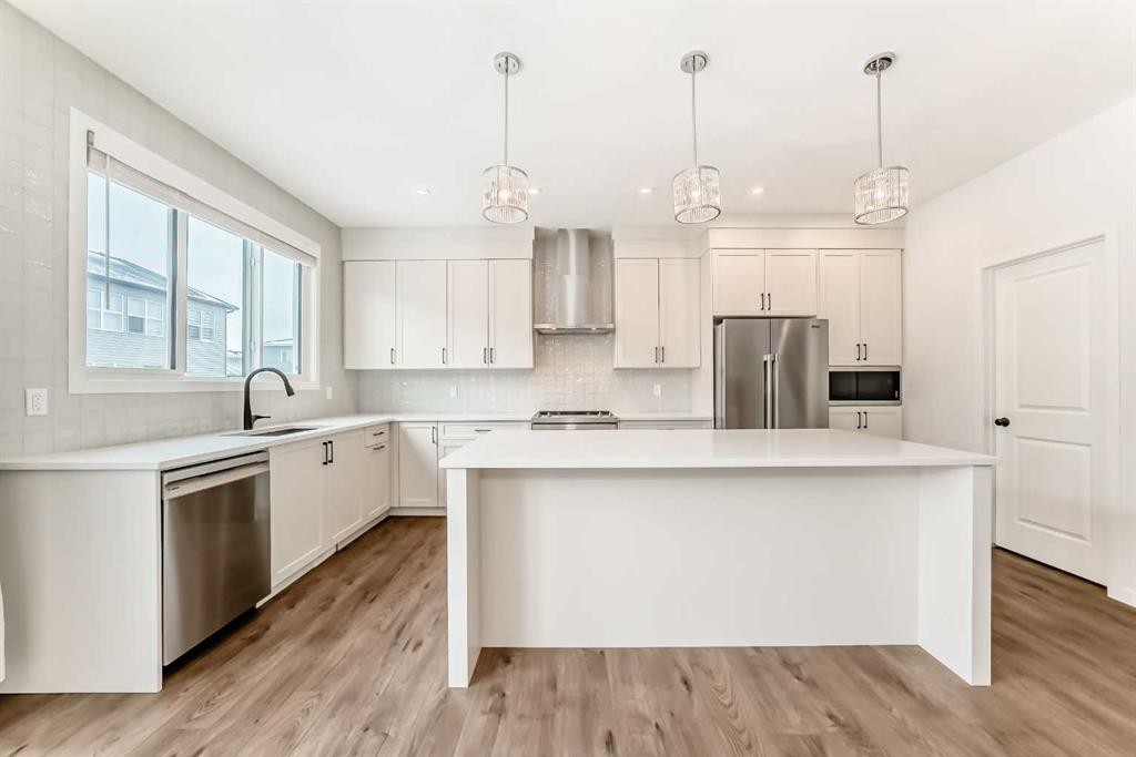 102 Setonstone Manor Se, Calgary, AB - Indoor Photo Showing Kitchen With Upgraded Kitchen