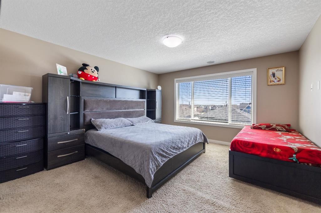 130 Brightonwoods Grove Se, Calgary, AB - Indoor Photo Showing Bedroom