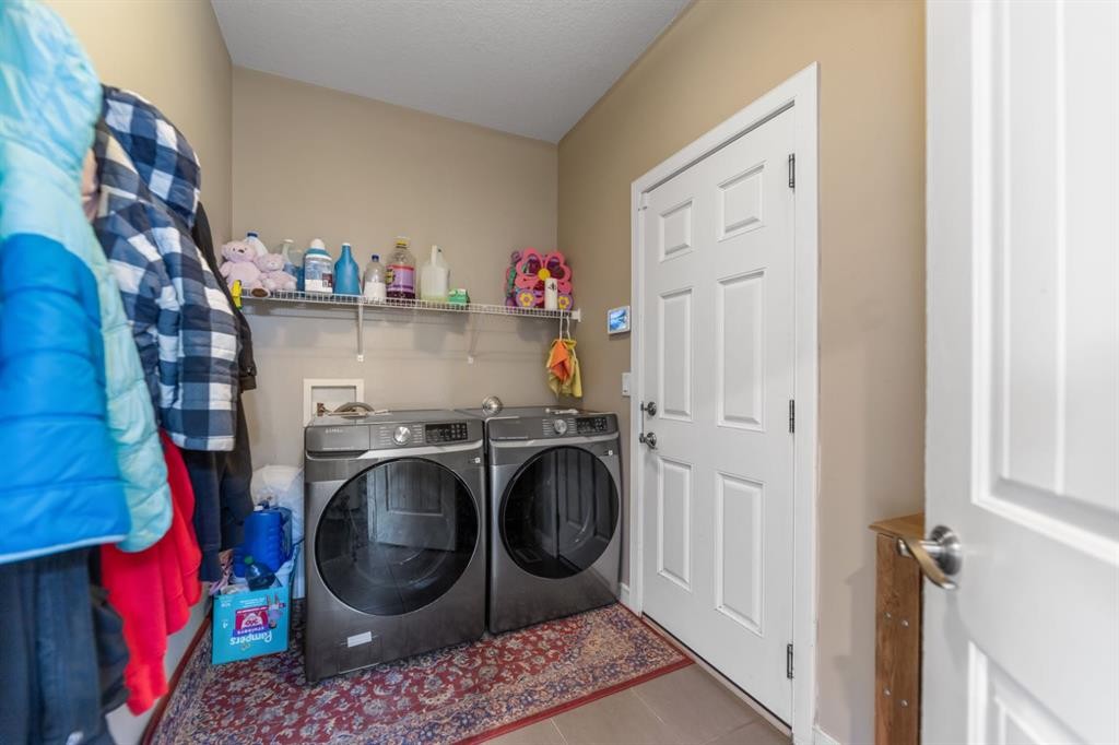 130 Brightonwoods Grove Se, Calgary, AB - Indoor Photo Showing Laundry Room