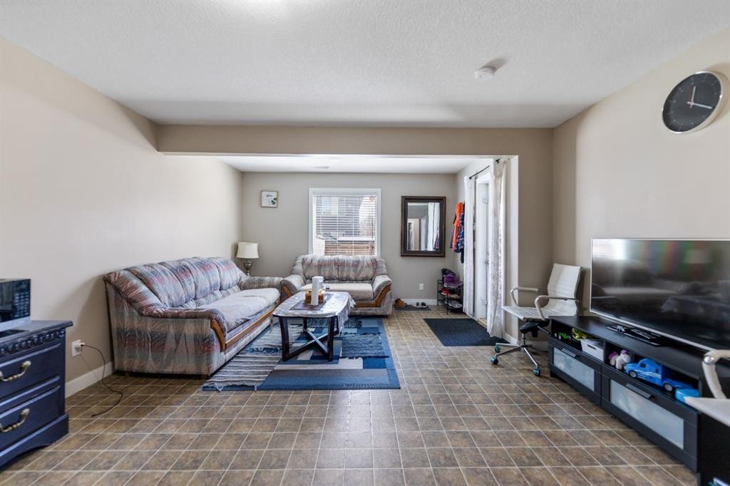 130 Brightonwoods Grove Se, Calgary, AB - Indoor Photo Showing Living Room