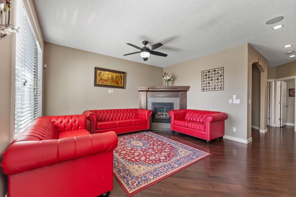 130 Brightonwoods Grove Se, Calgary, AB - Indoor Photo Showing Living Room With Fireplace