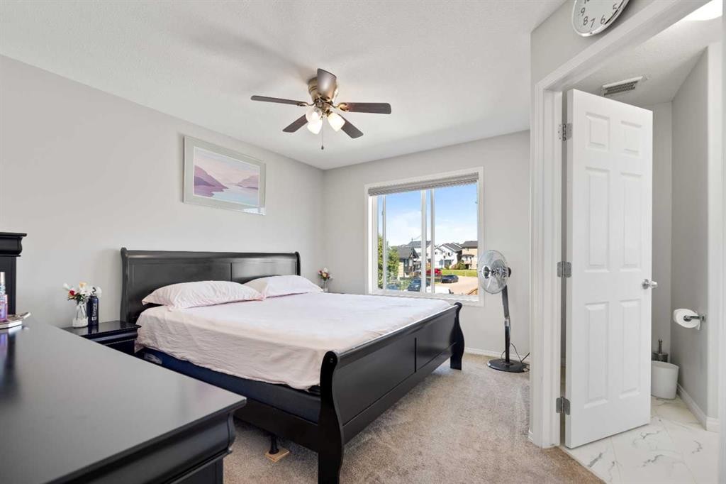 248 Taracove Road Ne, Calgary, AB - Indoor Photo Showing Bedroom