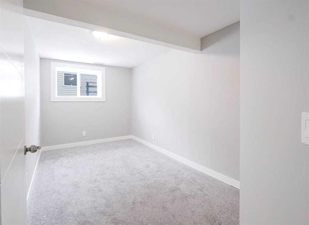 6923 Laguna Way Ne, Calgary, AB - Indoor Photo Showing Other Room