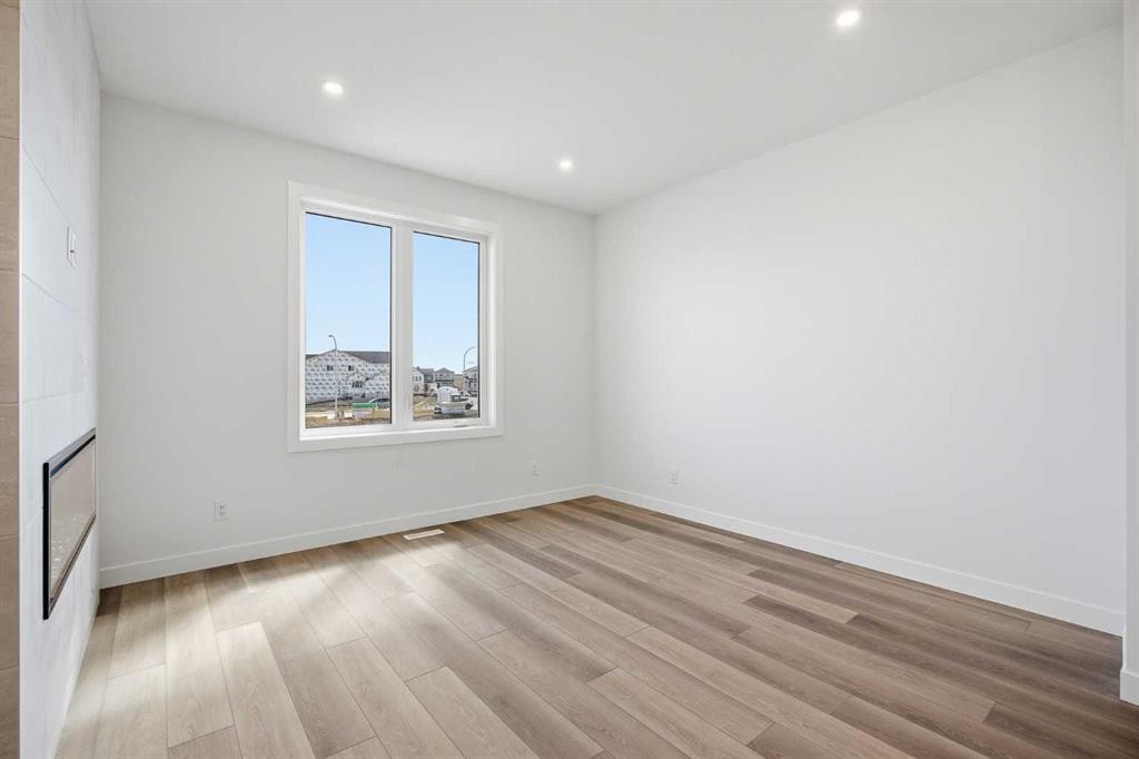 201 Bridgeport Gate, Chestermere, AB - Indoor Photo Showing Other Room