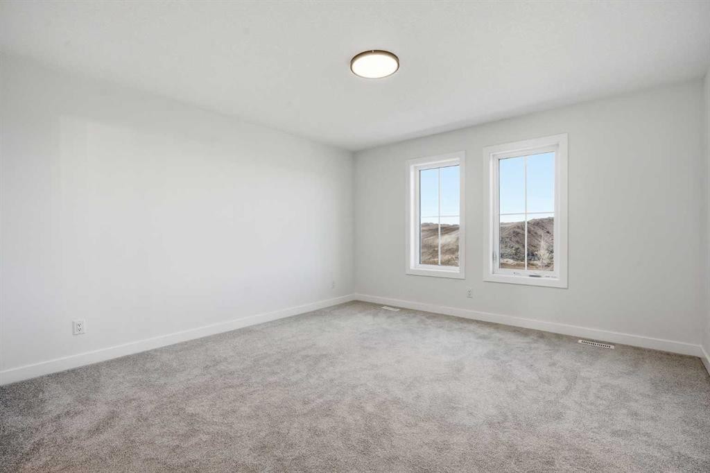 201 Bridgeport Gate, Chestermere, AB - Indoor Photo Showing Other Room