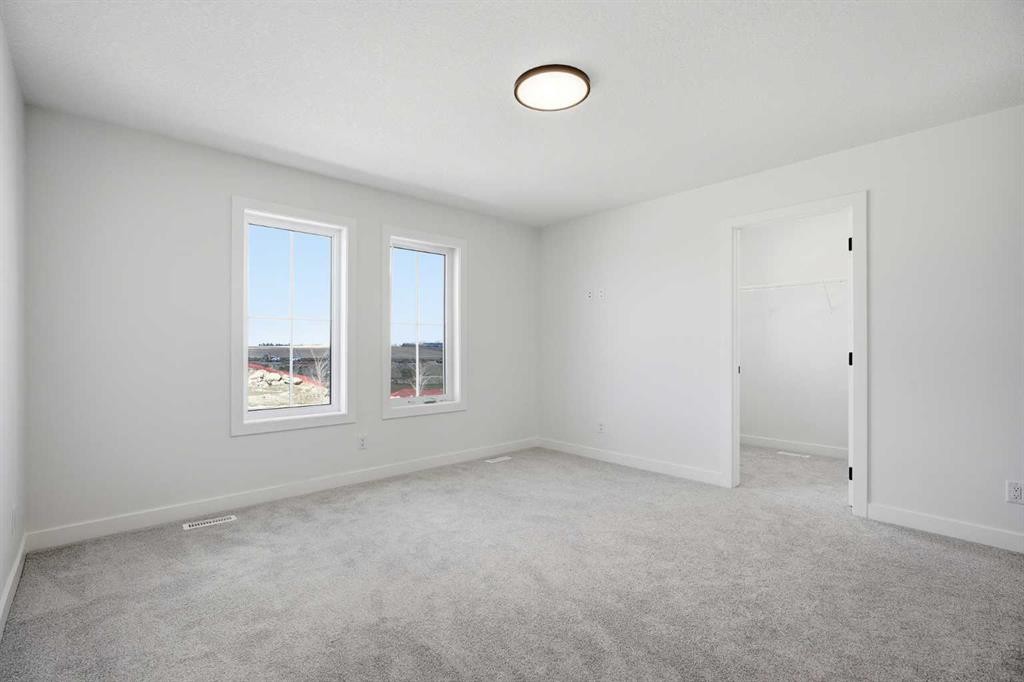 201 Bridgeport Gate, Chestermere, AB - Indoor Photo Showing Other Room