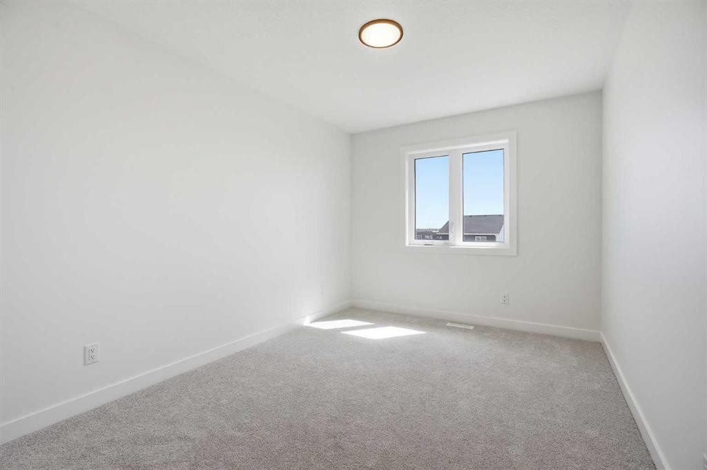 201 Bridgeport Gate, Chestermere, AB - Indoor Photo Showing Other Room