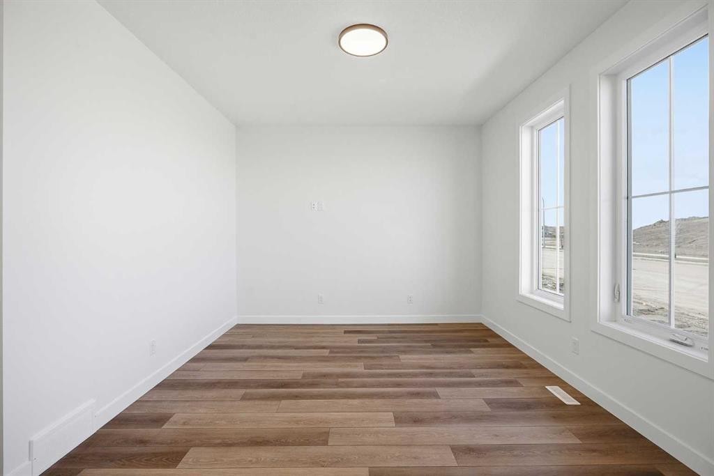 201 Bridgeport Gate, Chestermere, AB - Indoor Photo Showing Other Room