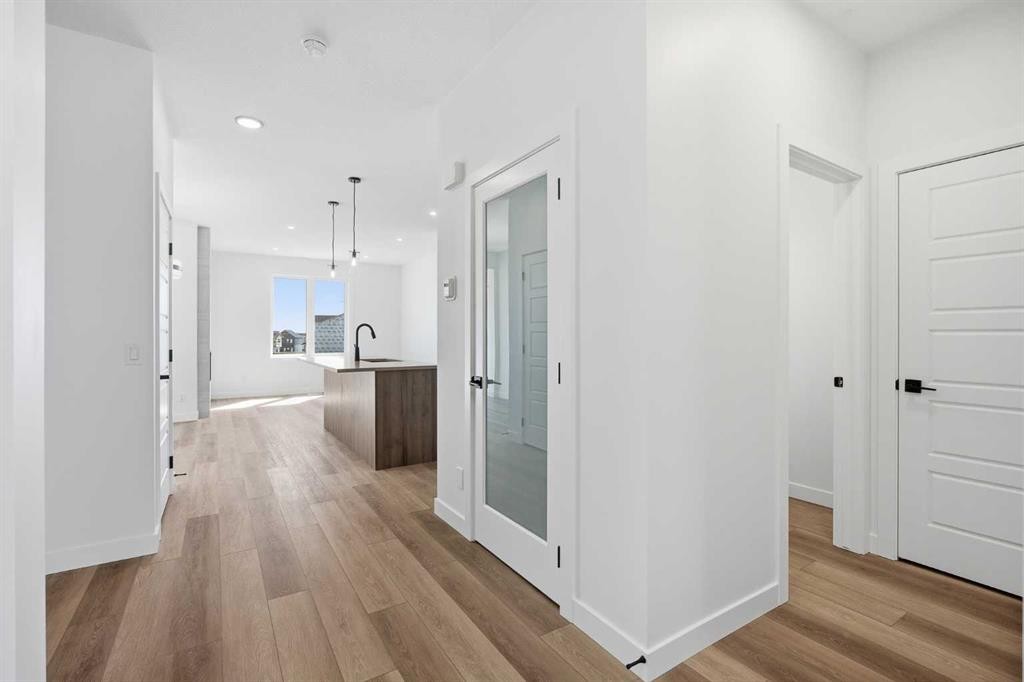 201 Bridgeport Gate, Chestermere, AB - Indoor Photo Showing Other Room