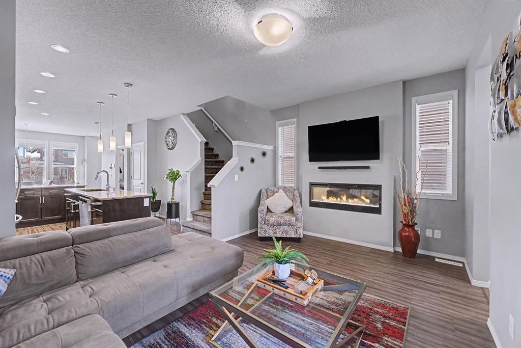 186 Cornerstone Avenue Ne, Calgary, AB - Indoor Photo Showing Living Room With Fireplace