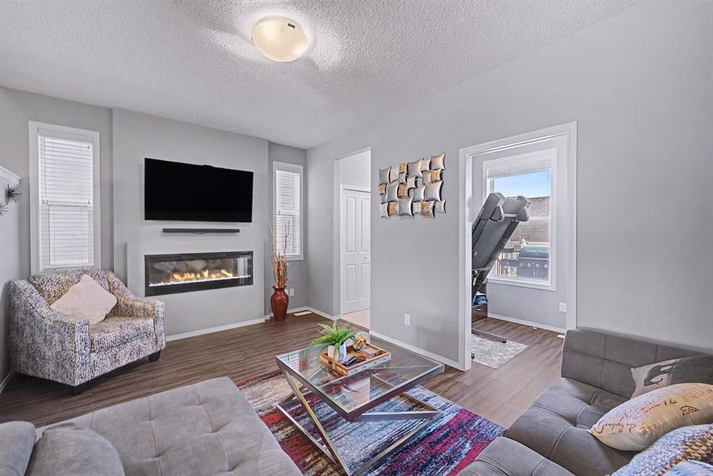 186 Cornerstone Avenue Ne, Calgary, AB - Indoor Photo Showing Living Room With Fireplace