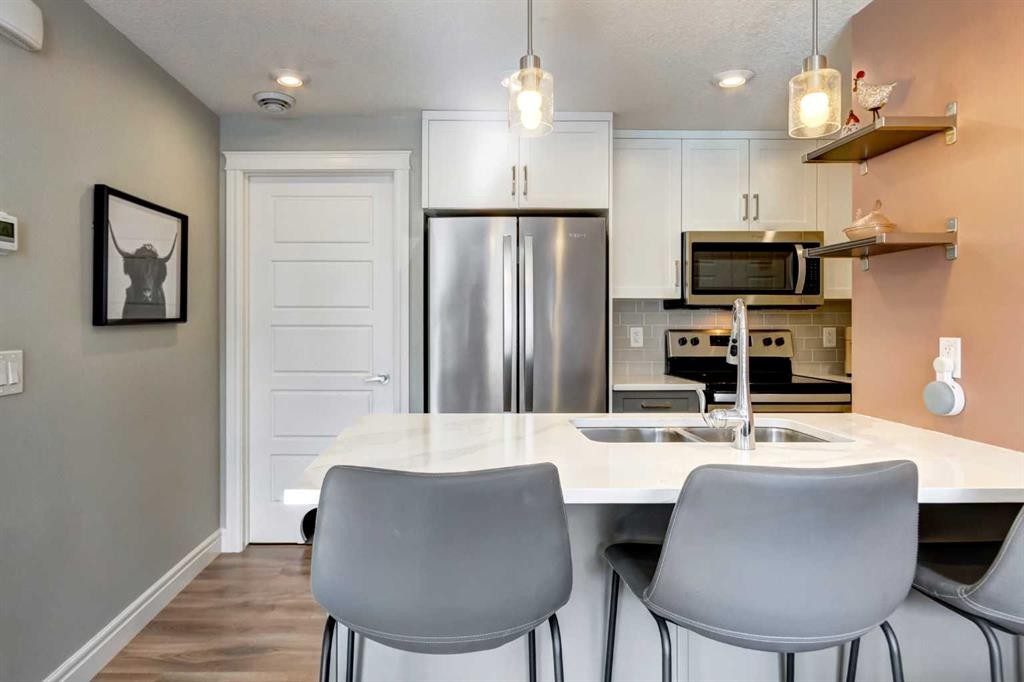 15-230 Seton Passage, Calgary, AB - Indoor Photo Showing Kitchen With Upgraded Kitchen