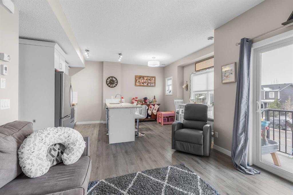 811-250 Fireside View, Cochrane, AB - Indoor Photo Showing Living Room