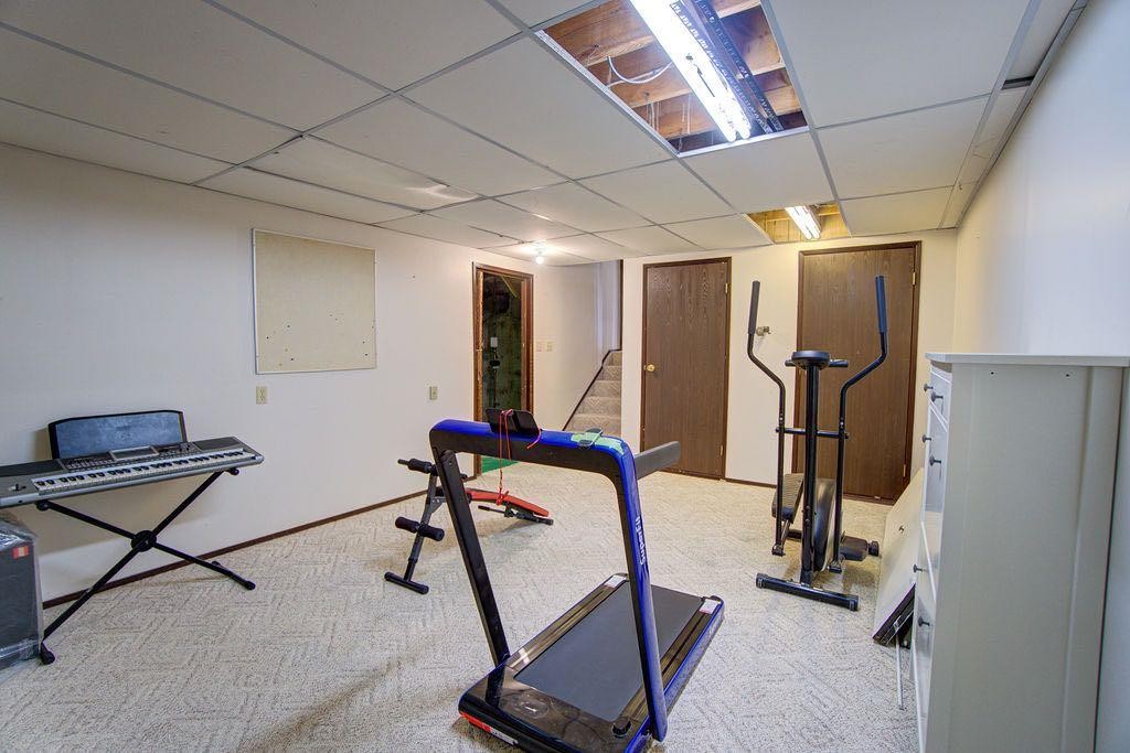 47 Willow Road, Claresholm, AB - Indoor Photo Showing Gym Room