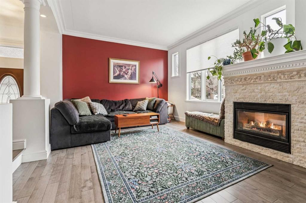 2211 Bowness Road Nw, Calgary, AB - Indoor Photo Showing Living Room With Fireplace