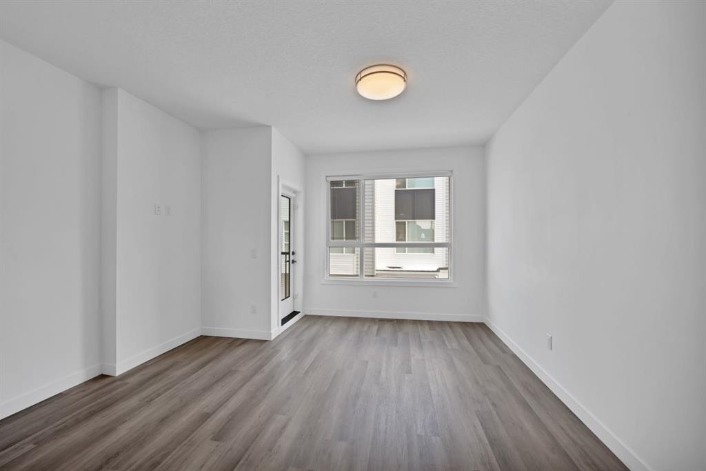 105 Panatella Square Nw, Calgary, AB - Indoor Photo Showing Other Room