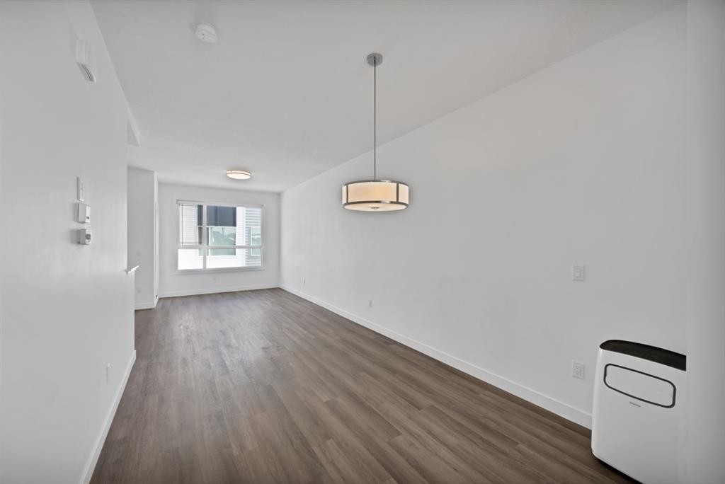 105 Panatella Square Nw, Calgary, AB - Indoor Photo Showing Other Room