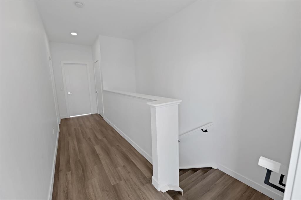 105 Panatella Square Nw, Calgary, AB - Indoor Photo Showing Other Room
