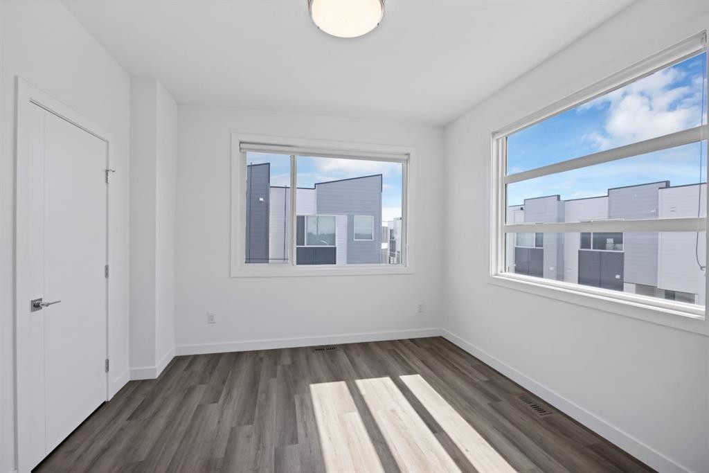 105 Panatella Square Nw, Calgary, AB - Indoor Photo Showing Other Room