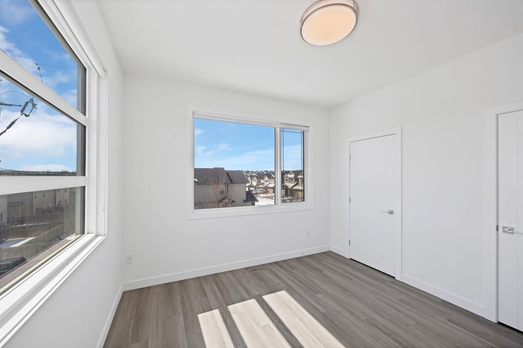 105 Panatella Square Nw, Calgary, AB - Indoor Photo Showing Other Room