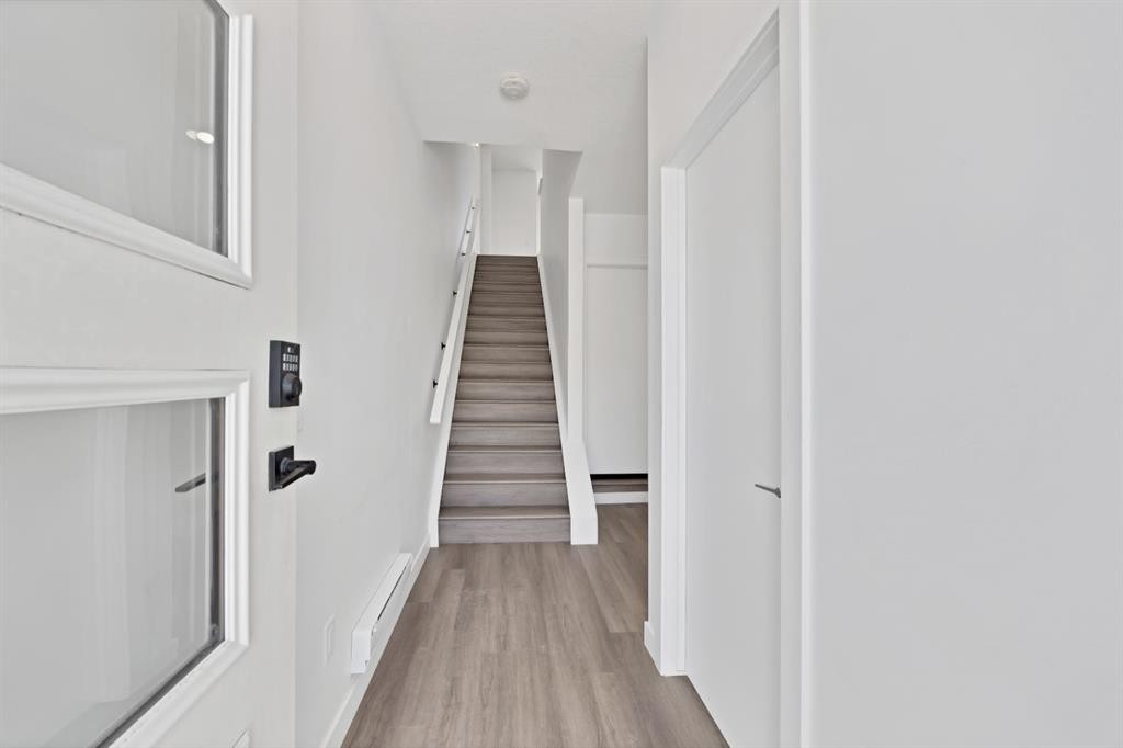 105 Panatella Square Nw, Calgary, AB - Indoor Photo Showing Other Room