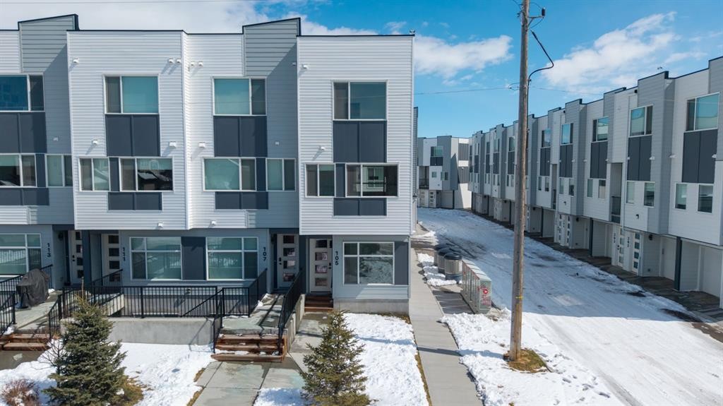 105 Panatella Square Nw, Calgary, AB - Outdoor With Facade