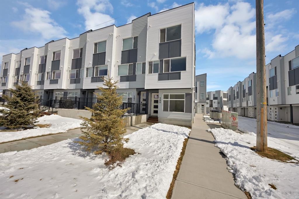 105 Panatella Square Nw, Calgary, AB - Outdoor With Facade