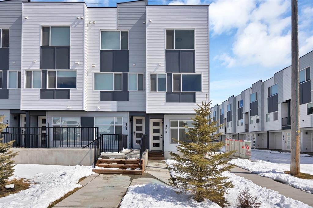 105 Panatella Square Nw, Calgary, AB - Outdoor With Facade