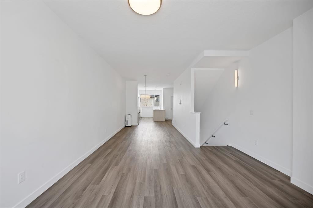 105 Panatella Square Nw, Calgary, AB - Indoor Photo Showing Other Room