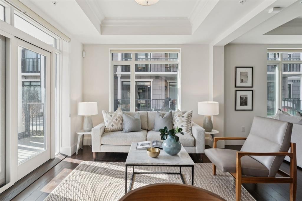 103-211 Quarry Way Se, Calgary, AB - Indoor Photo Showing Living Room