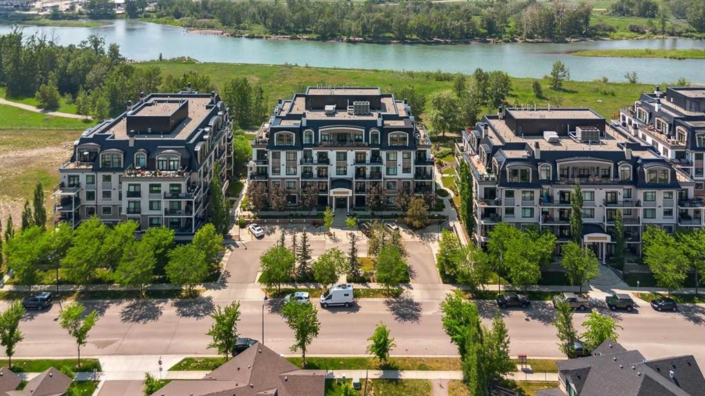 103-211 Quarry Way Se, Calgary, AB - Outdoor With Body Of Water With View