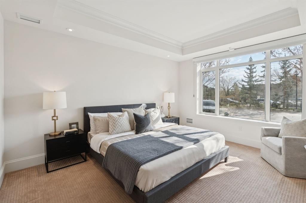103-211 Quarry Way Se, Calgary, AB - Indoor Photo Showing Bedroom