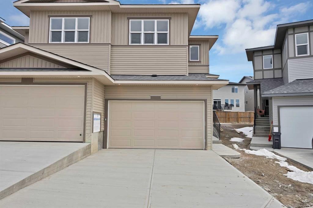 82 Heritage Circle, Cochrane, AB - Outdoor With Exterior