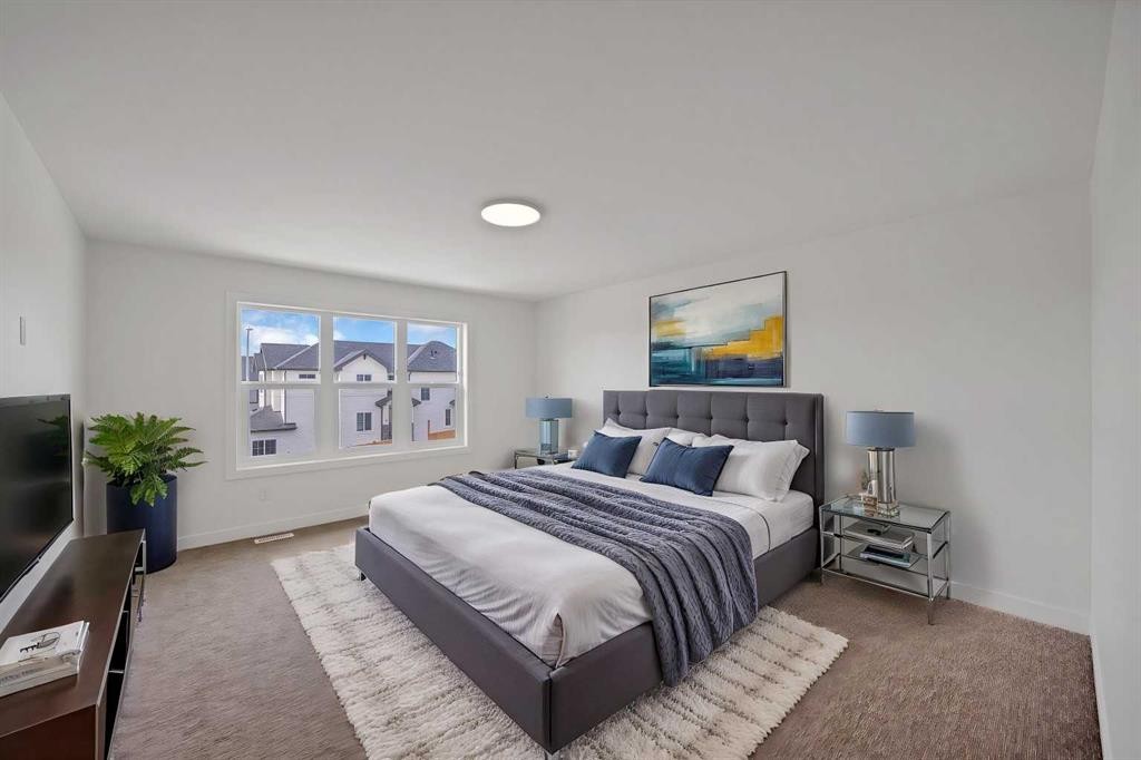 82 Heritage Circle, Cochrane, AB - Indoor Photo Showing Bedroom