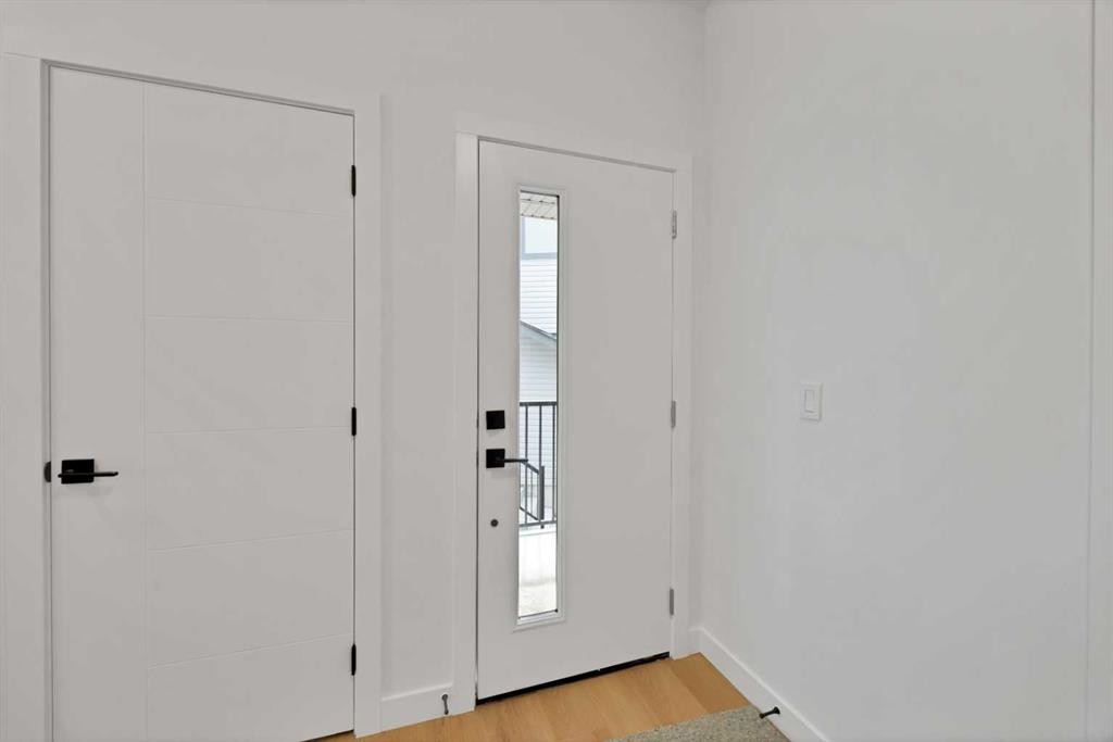 82 Heritage Circle, Cochrane, AB - Indoor Photo Showing Other Room