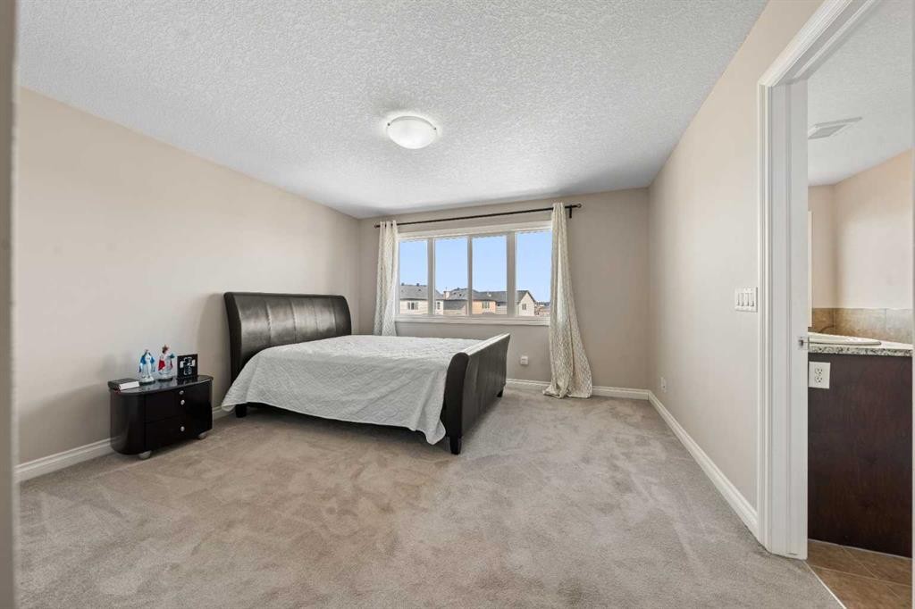 529 Saddlelake Drive Ne, Calgary, AB - Indoor Photo Showing Bedroom