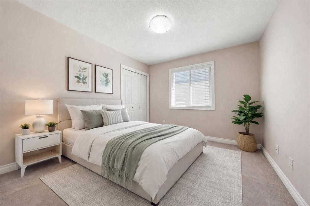529 Saddlelake Drive Ne, Calgary, AB - Indoor Photo Showing Bedroom