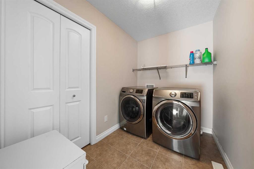 529 Saddlelake Drive Ne, Calgary, AB - Indoor Photo Showing Laundry Room