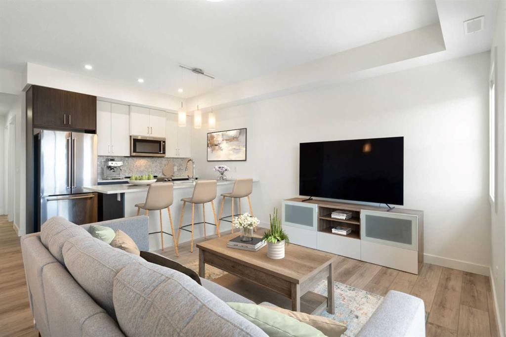 132 Spring Creek Common Sw, Calgary, AB - Indoor Photo Showing Living Room