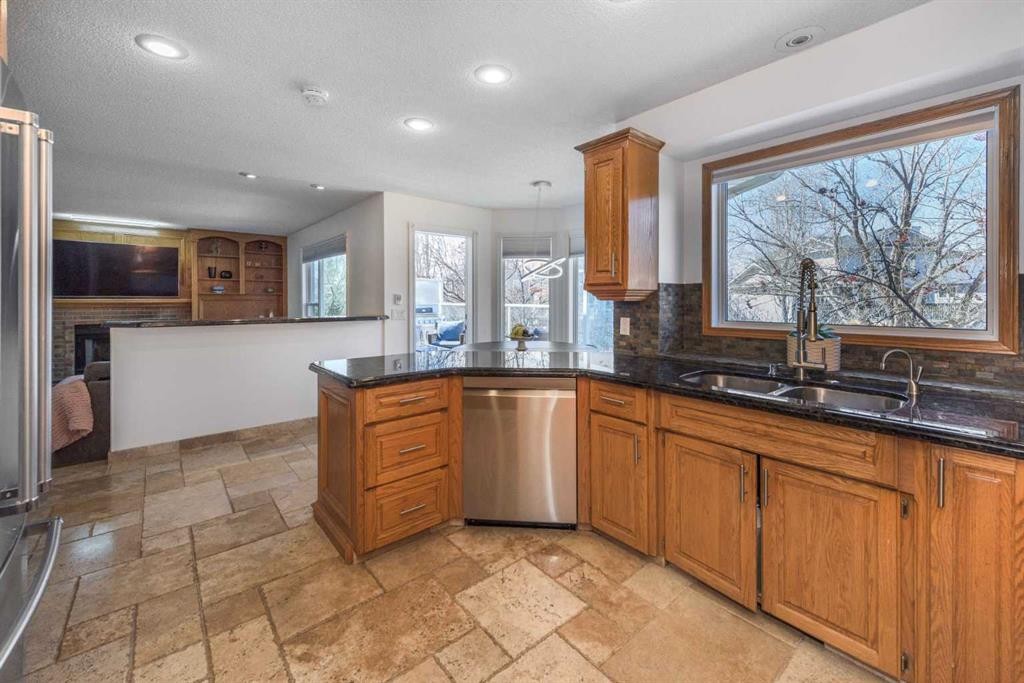 179 Scanlon Green Nw, Calgary, AB - Indoor Photo Showing Kitchen With Double Sink