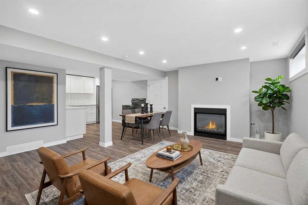252 Allan Crescent Se, Calgary, AB - Indoor Photo Showing Living Room With Fireplace