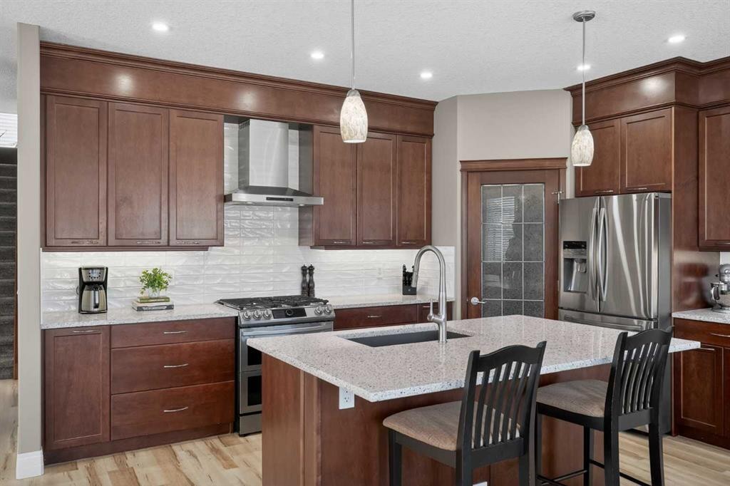 385 Rainbow Falls Way, Chestermere, AB - Indoor Photo Showing Kitchen With Stainless Steel Kitchen With Upgraded Kitchen